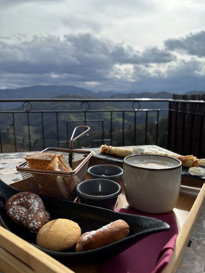Coffee on the terrace with the mountains behind